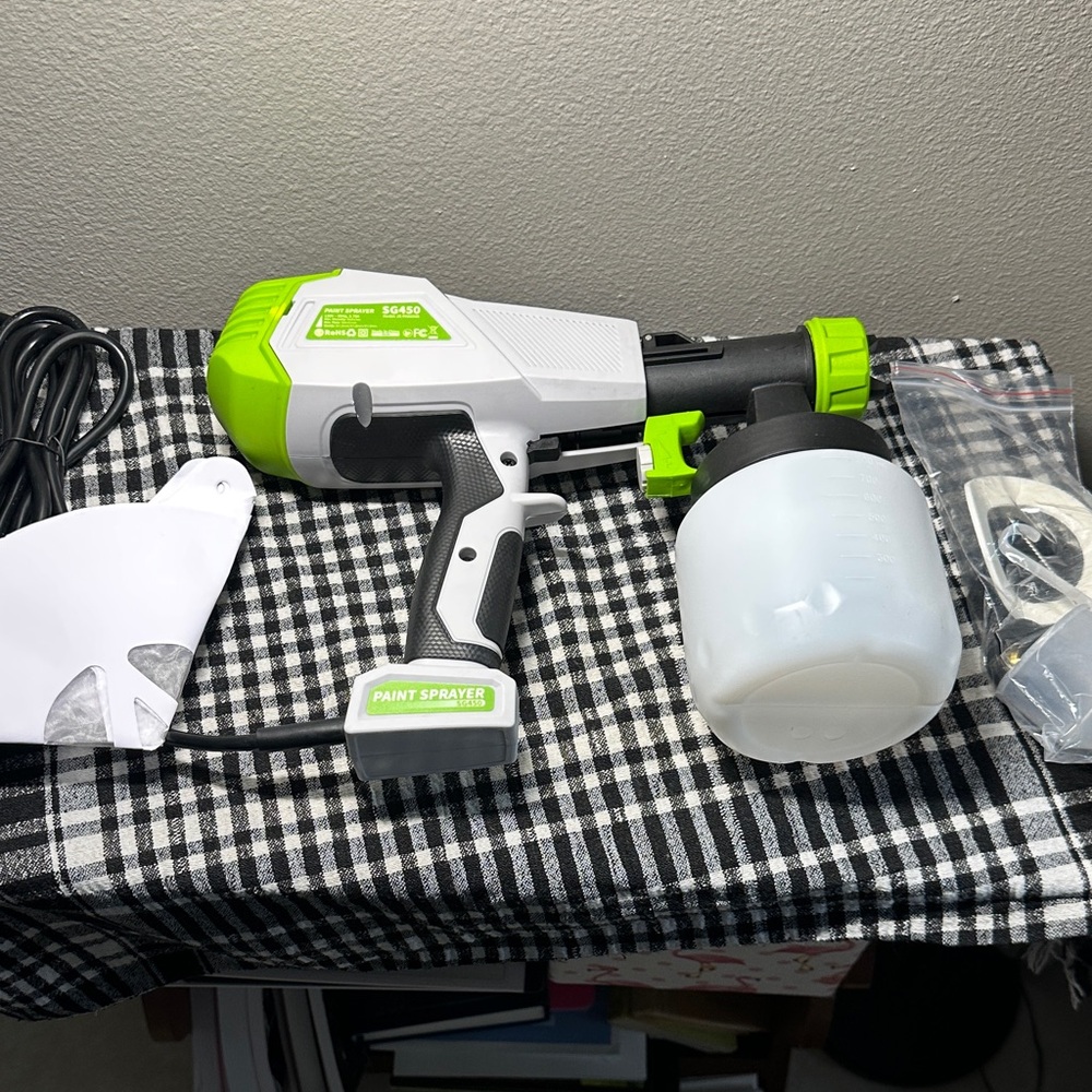 Green and White Paint Sprayer with all attachments New never used.